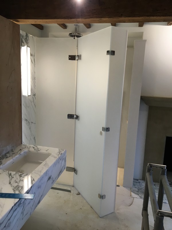 Bespoke frosted glass shower enclosure in Balham luxury bathroom