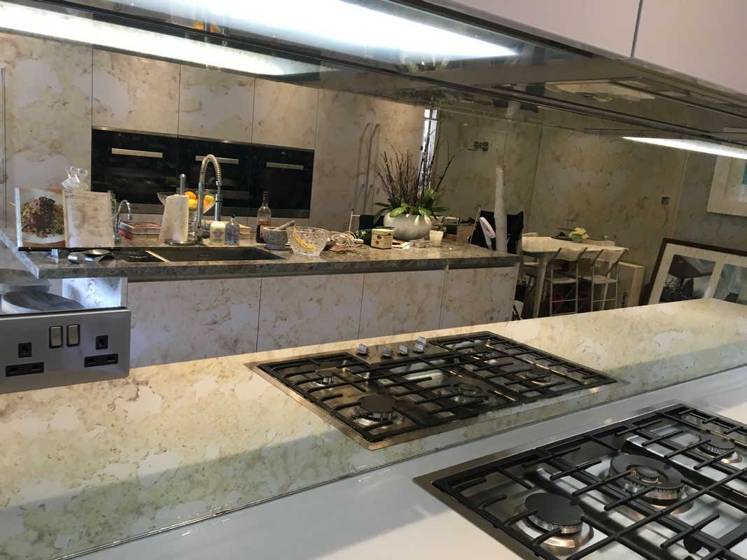 Mirror glass splashback in Balham luxury kitchen